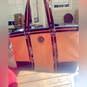 Tory Burch straw and black Patton leather tote purse.